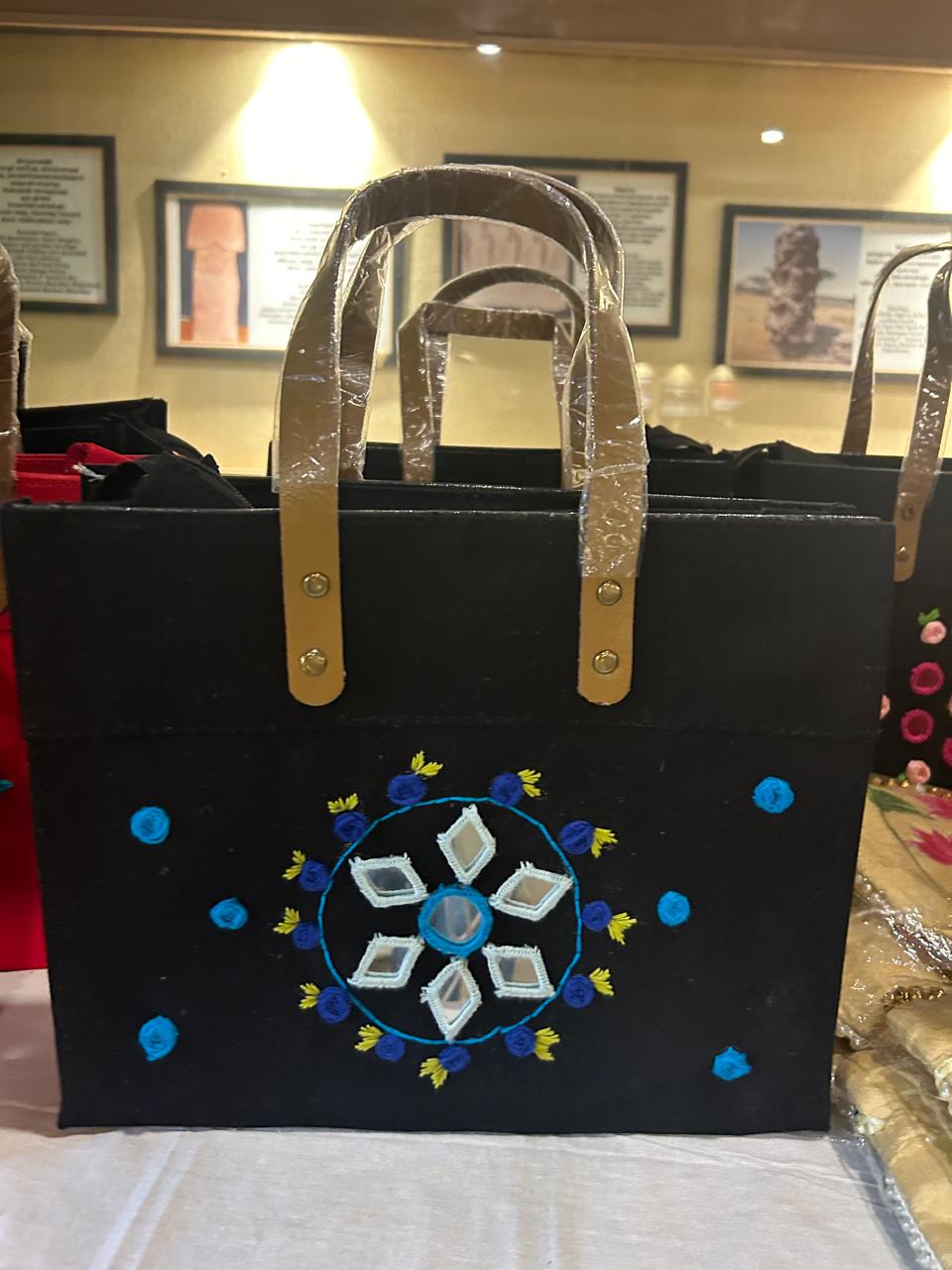 Black Laminated Canvas Tote Bag with Blue Floral & Mirror Embroidery – Handmade Handbag (12 x 10 x 6 inch)