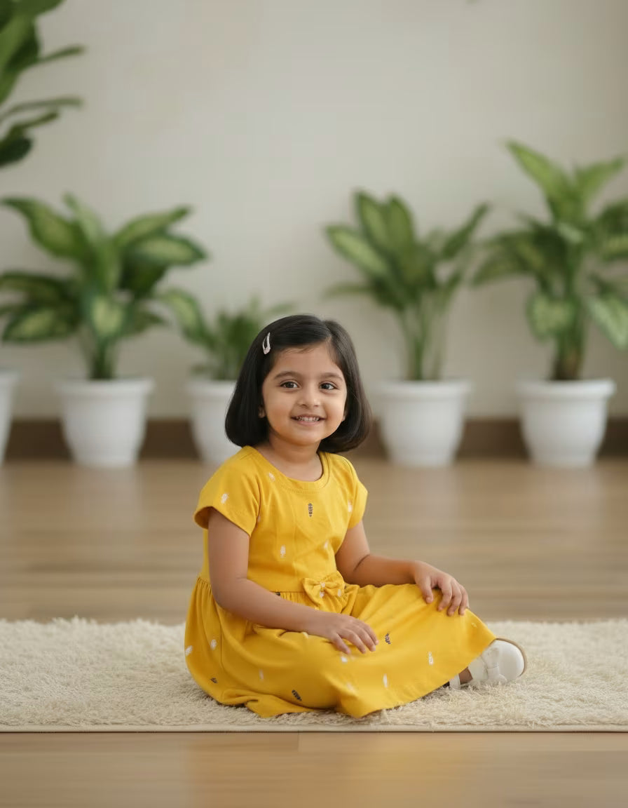 Girls Mustard Yellow Printed Cotton Dress with Bow Detail