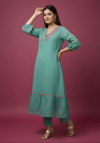 Sea Green Mul Chanderi Tiered Kurta & Pants Set with Embroidered Angrakha Yoke & Puff Sleeves