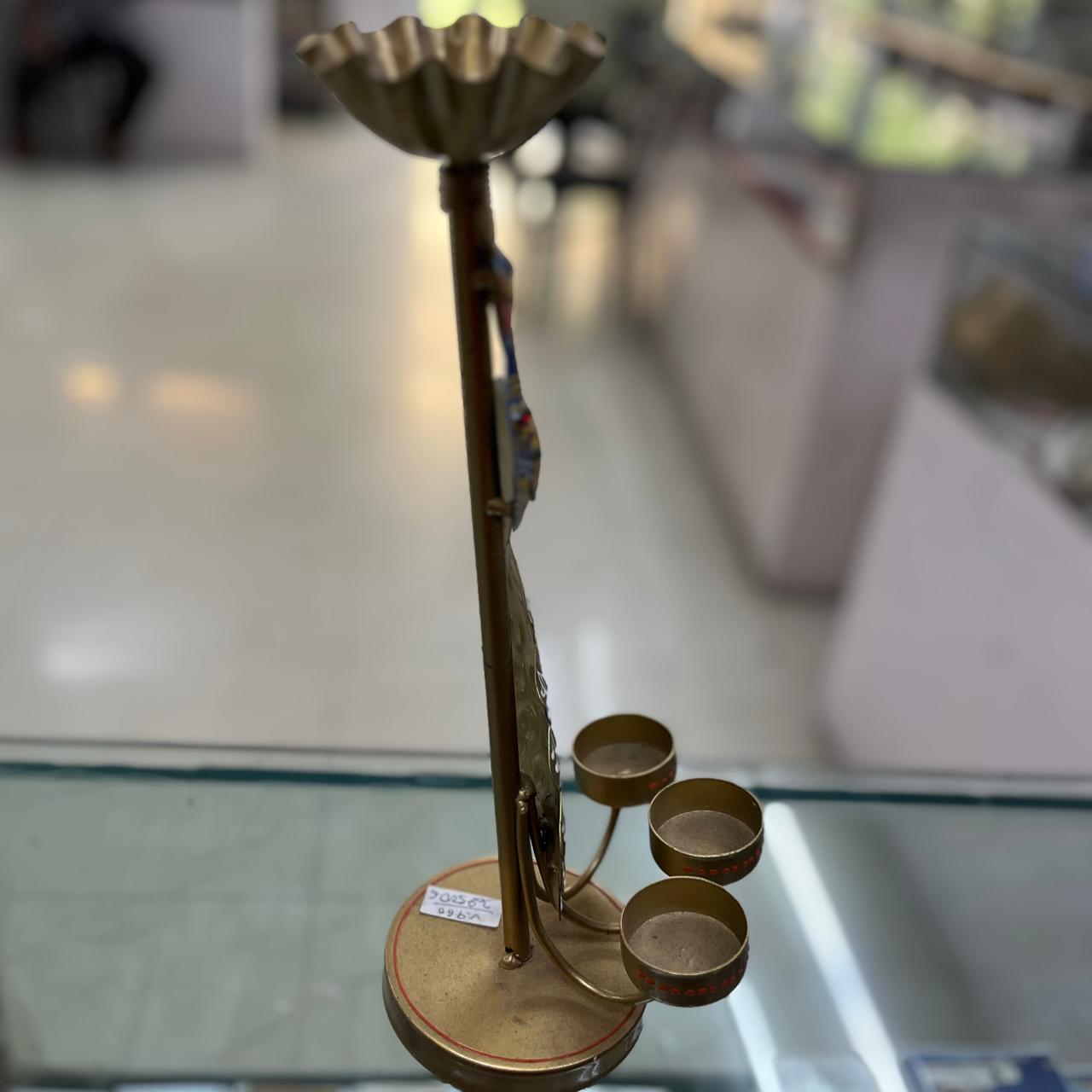 Handcrafted Brass Peacock Diya Stand – Multi-Colored Decorative Oil Lamp Holder