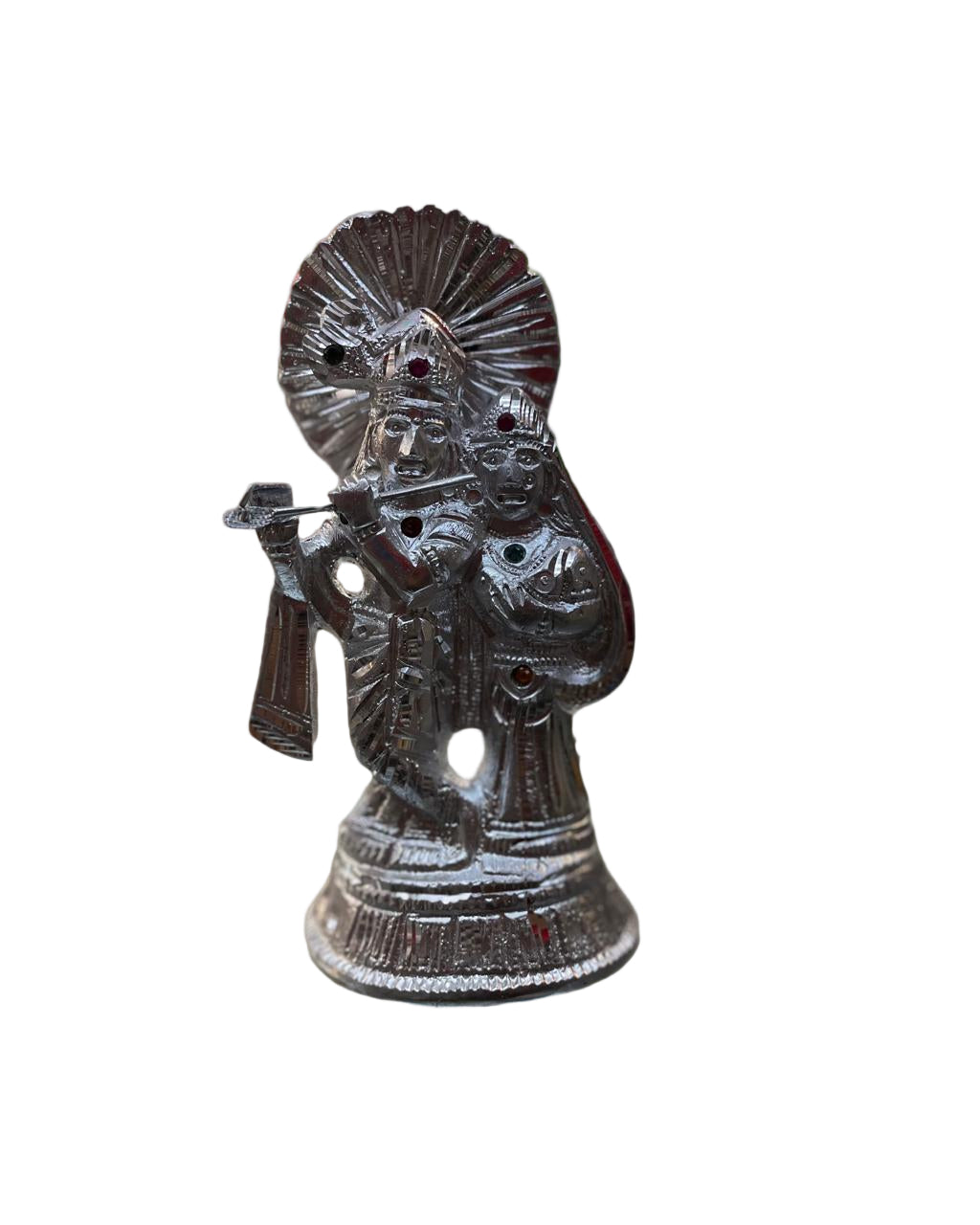 Statue of a deity on a reflective surface with a blurred background