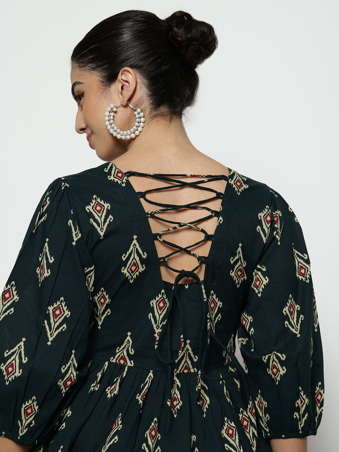 Dark Green Ikat Print Cotton Peplum Top