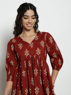 Dark Green Ikat Print Cotton Peplum Top