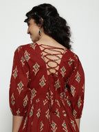 Dark Green Ikat Print Cotton Peplum Top