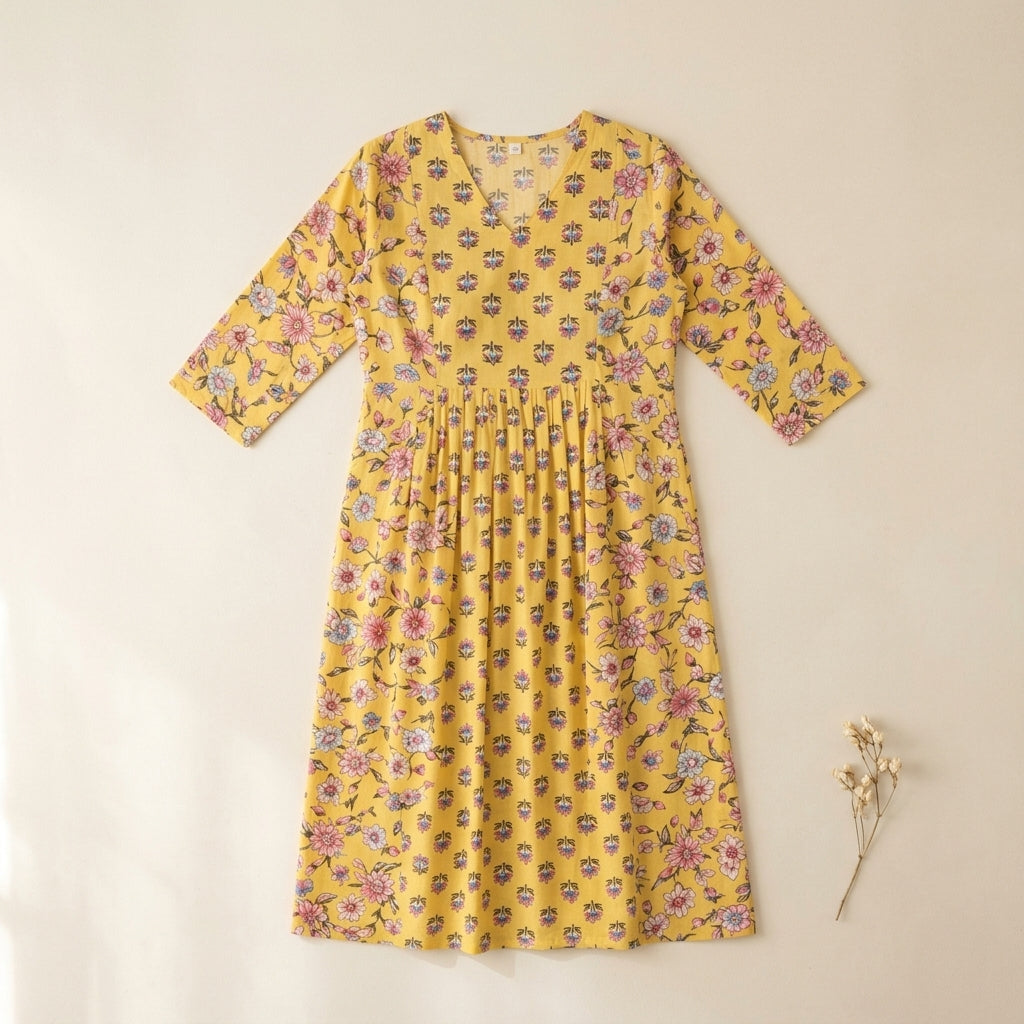 Women’s Floral Printed Cotton Kurti | Yellow V-Neck A-Line Kurta